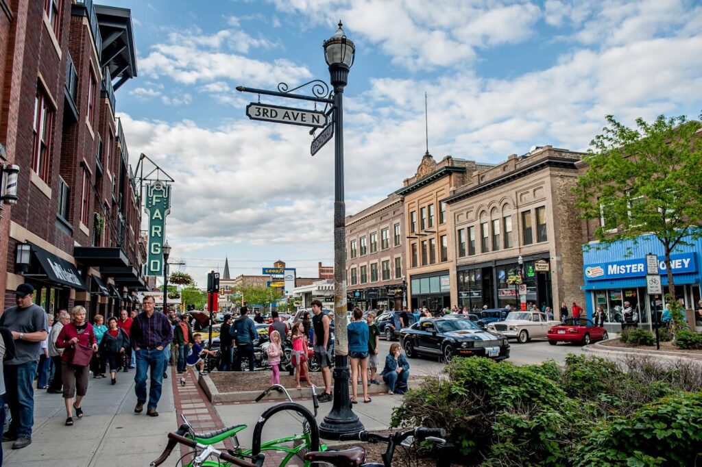 A town in North Dakota with people on the street